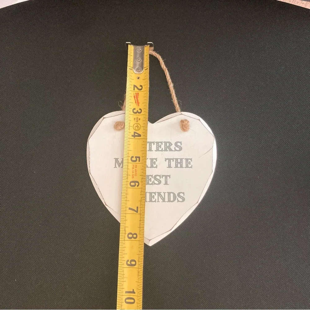 Heart Shaped wooden “sisters make the best friends” home decor